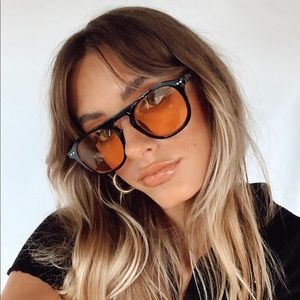 Sunglasses with orange lens